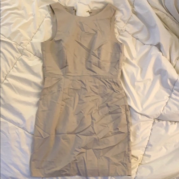 Light gray/tan dress with open back